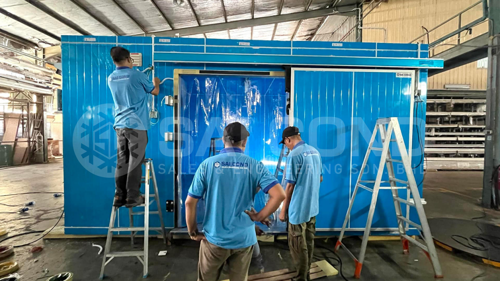 A professional technician performing routine maintenance on a cold room refrigeration system to ensure optimal cooling performance and efficiency.